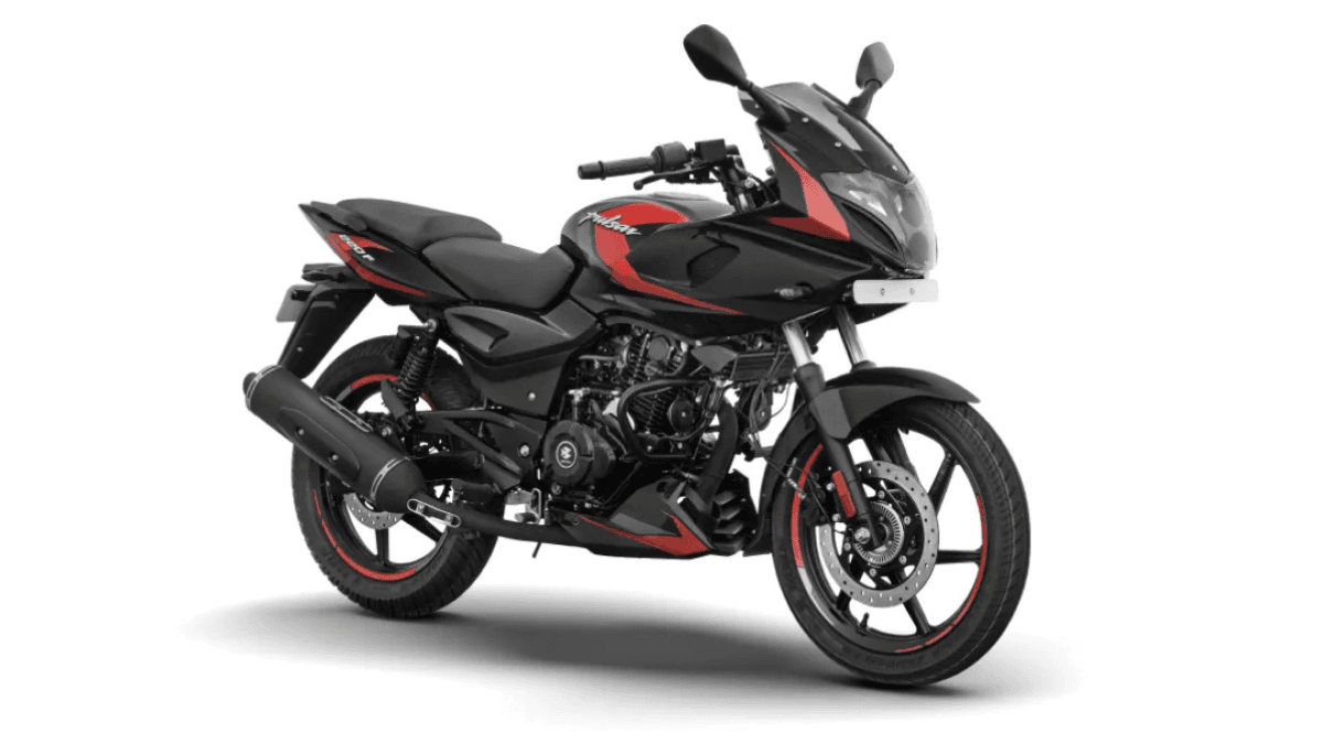 India's cult commuter gets LED projectors at ₹1.36 lakh 1 Black and red Pulsar 220F motorcycle at a three-quarter angle on a white backdrop facelift.