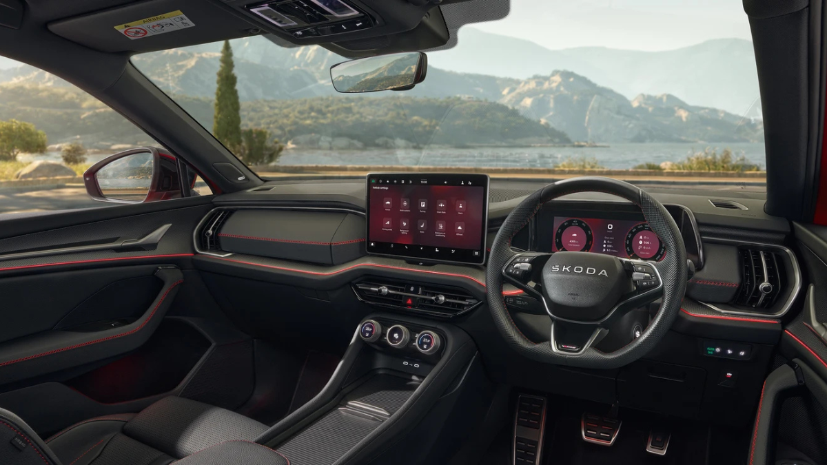 Does the quickest Škoda SUV justify its limited 50-unit run? 1 Right hand drive black dashboard of a Skoda Kodiaq RS showing a large touchscreen and digital cluster for India buyers.