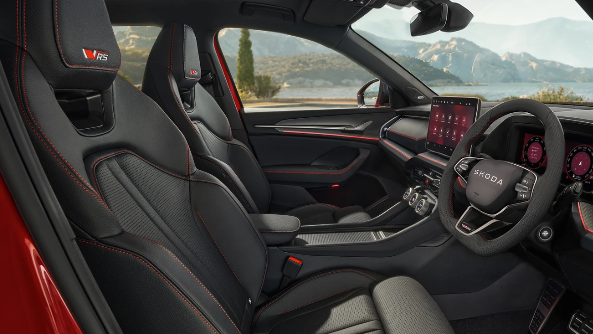 Does the quickest Škoda SUV justify its limited 50-unit run? 2 Black leather front bucket seats with red stitching and a vRS headrest badge inside the Skoda Kodiaq RS SUV for India.