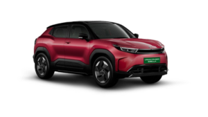 A dual-tone red and black Toyota Urban Cruiser Ebella electric SUV on a white studio background for the India market.
