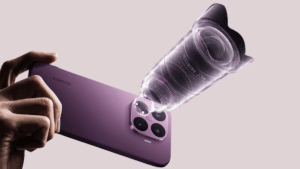 Hand holding a purple Xiaomi smartphone with a 3D periscope lens element floating over the rear camera array in India.