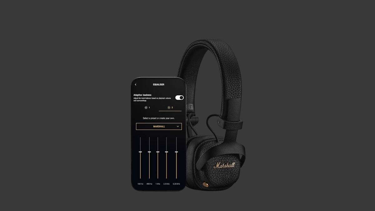 The Mid-Range Upgrade That Outlasts Your Week 2 A smartphone showing an equaliser screen stands next to black on-ear headphones against a dark background context.