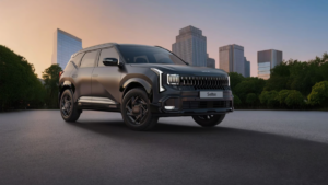 Matte graphite SUV on asphalt ground with city skyscrapers in the background under a sunset sky Seltos.