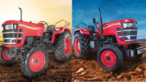 Two red Mahindra Yuvo Tech tractors on brown tilled soil fields under orange and blue skies in India.