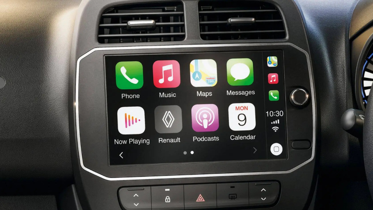 Six airbags and an 8-inch screen for under ₹6 lakh 1 Close-up of an eight-inch touchscreen display showing menu icons on a car dashboard below horizontal air vents.