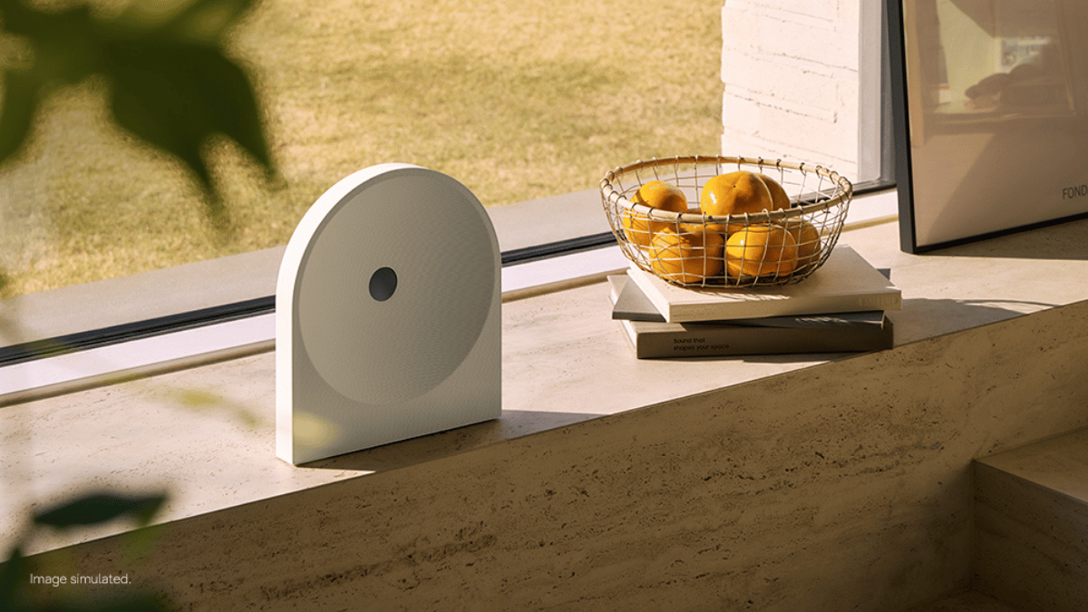 The wireless audio setup that actually blends into your room 1 Compact black speaker with a textured dot pattern on the front surface, resting on a white table, India launch.