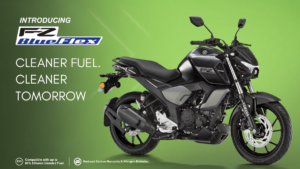 Metallic Black Yamaha FZ Blue Flex motorcycle shown on a plain green studio backdrop with promotional text layout.