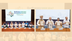 Seated officials holding the Delhi Master Plan 2047 document before a stage backdrop screen presentation.