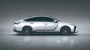Rear quarter, multi-spoke alloy wheels, door handles, and side mirror on the white Lexus ES 350h side profile.