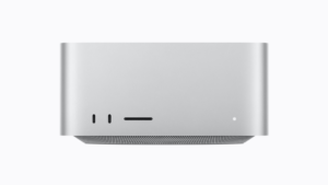 Silver Mac Studio desktop with two front ports, card slot, and LED indicator on white background hardware.