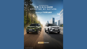 Green Nexon CAMO Edition crossover left, silver crossover right, trees and skyscrapers background vehicle.
