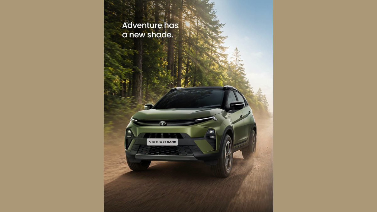 Fresh tech and styling upgrades hit the Nexon CAMO Edition from ₹9.99 lakh 1 Green crossover driving on dirt road, forest trees and sunlight background vehicle.