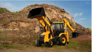 Raised front bucket, yellow cab, and rear excavator arm of a JCB 3DX backhoe loader against a rocky hill quarry.