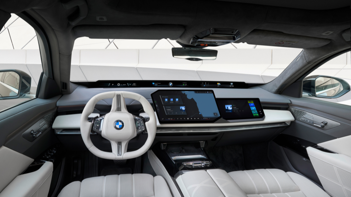 Flagship 7 Series range arrives in India from Rs 1.95 crore 2 A white steering wheel on the left sits beside two digital displays, with a panoramic projection across the windscreen.