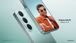 : Pistachio Galaxy S26 FE triple rear cameras beside display showing a man wearing sunglasses smartphone.