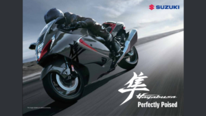 On the left, a rider leans forward on a grey Suzuki Hayabusa, with the brand logo and text aligned on the right.