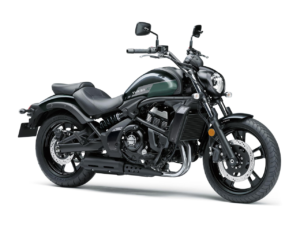 Black rear wheel, low seat, dark fuel tank, engine, oval headlight, and front tire of a Kawasaki Vulcan S cruiser.
