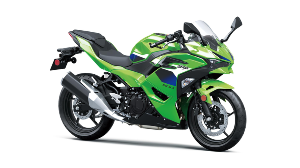 MY2027 Ninja 500 introduces fresh colours for Indian riders 1 Rear exhaust, green side fairing with blue decals, front wheel and windscreen against a white backdrop studio.