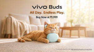 Orange cat lying beside a green vivo Buds earbud and case, with a beige sofa and table behind promotional.