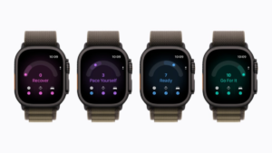 Four Apple Watch Ultra smartwatches displaying Recover, Pace Yourself, Ready, and Go For It screens in a row interface.