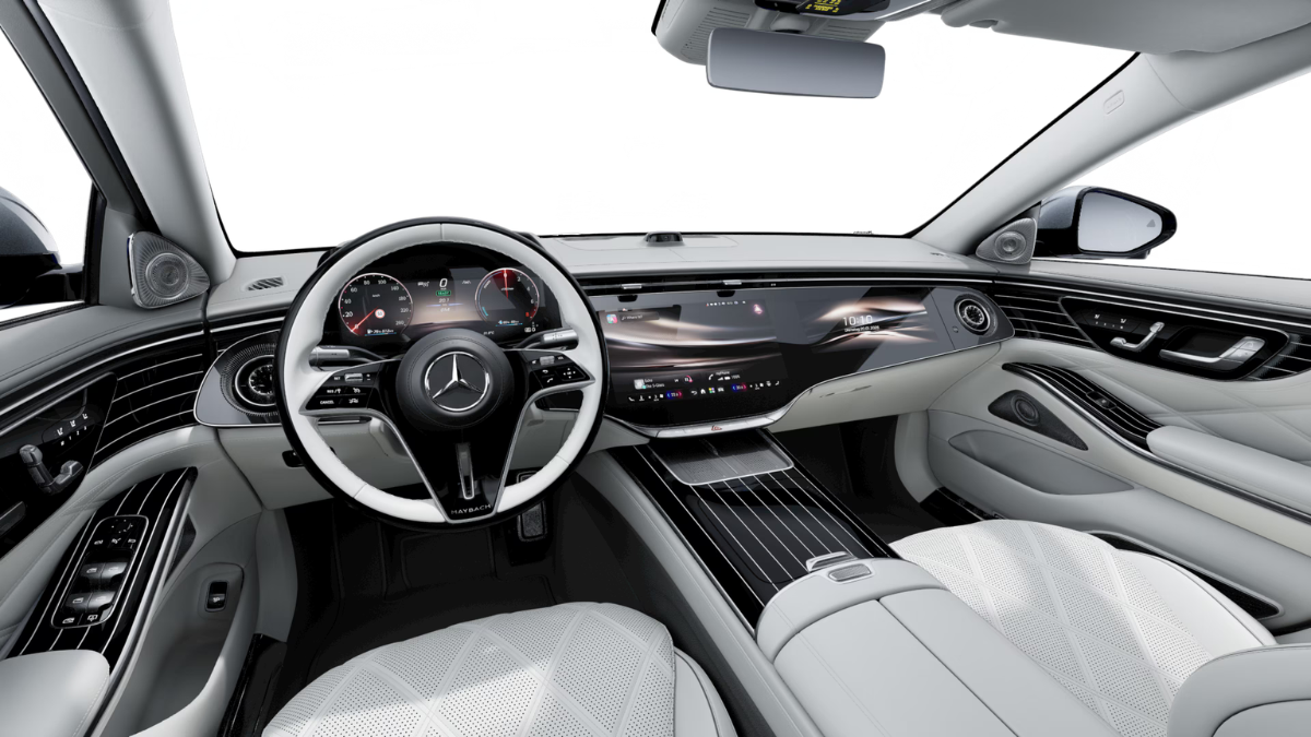 Mercedes-Maybach S 580e Launches in India at ₹3.35 Crore 1 Steering wheel on the left leads to a central touchscreen and passenger dash, framed by white seats in the foreground.